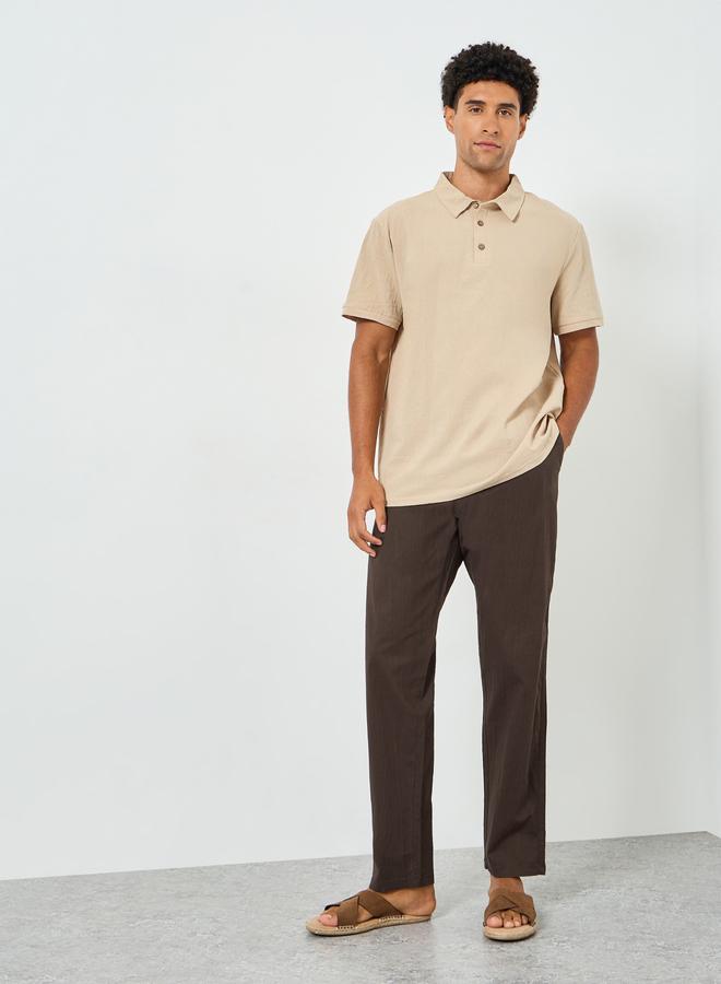 Styli Men Brown Pleated Tapered Linen Trousers - Image 1